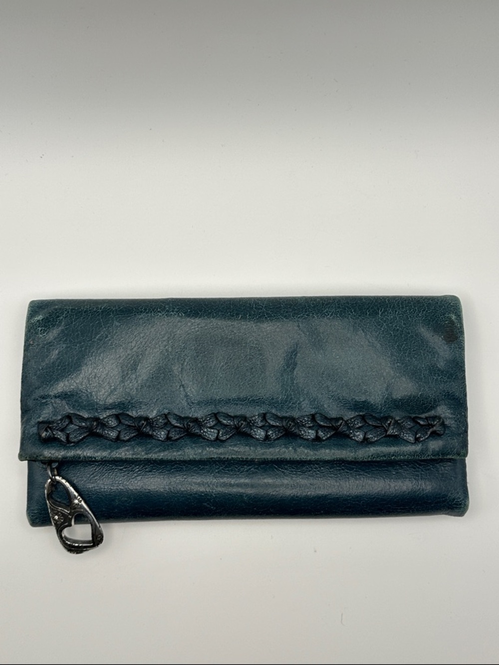 Brighton Teal Fold-Over Wallet with Braided Accent and Magnetic Closure.